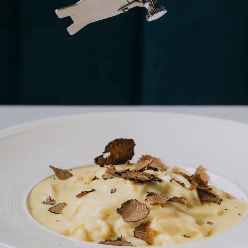 Truffle shaved over pasta