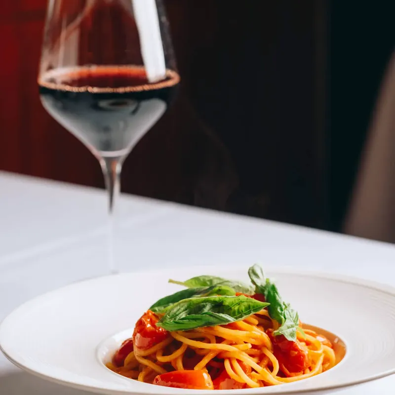 Spaghetti al pomodoro and a glass of red